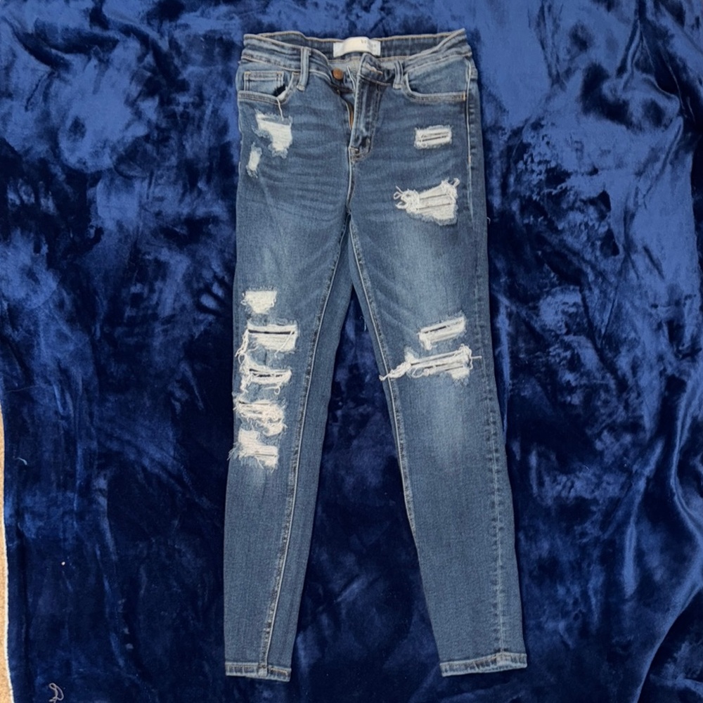 Blue Skinny Jeans with Distressed Details